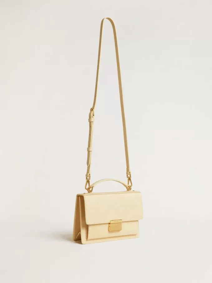 Venezia-tas van beige leer met pythonprint en gouden details