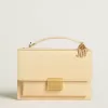 Venezia-tas van beige leer met pythonprint en gouden details