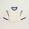 Verouderd wit katoenen cropped T-shirt met tekst op de achterkant