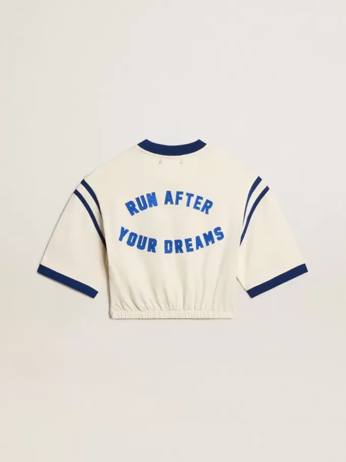 Verouderd wit katoenen cropped T-shirt met tekst op de achterkant