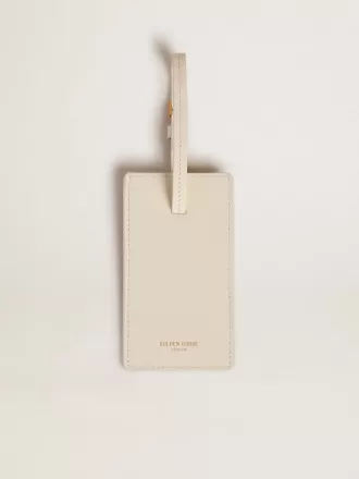 Versleten witte bagagelabel