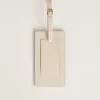 Versleten witte bagagelabel