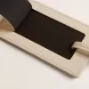 Versleten witte bagagelabel