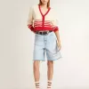 Versleten witte sokken met distressed details en bruine strepen