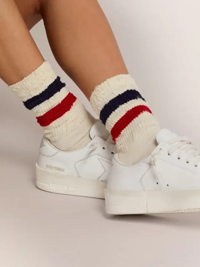 Vintage witte sokken met distressed details en tweekleurige strepen