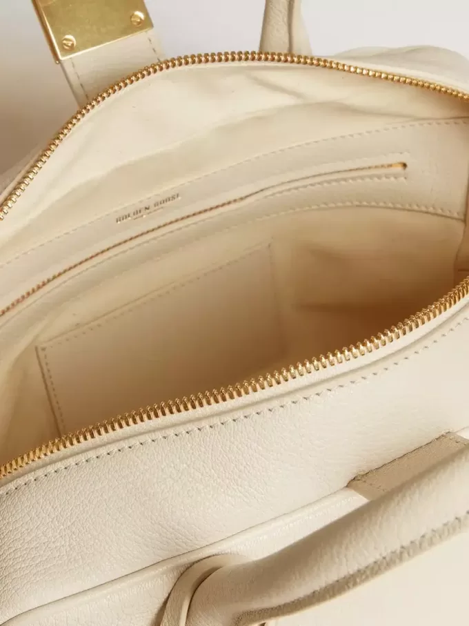Vita-tas in boterkleurig leer met gouden details