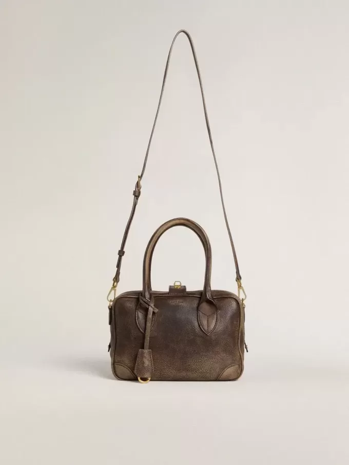 Vita-tas in bruin vintage leer met gouden details