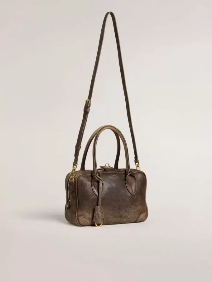 Vita-tas in bruin vintage leer met gouden details