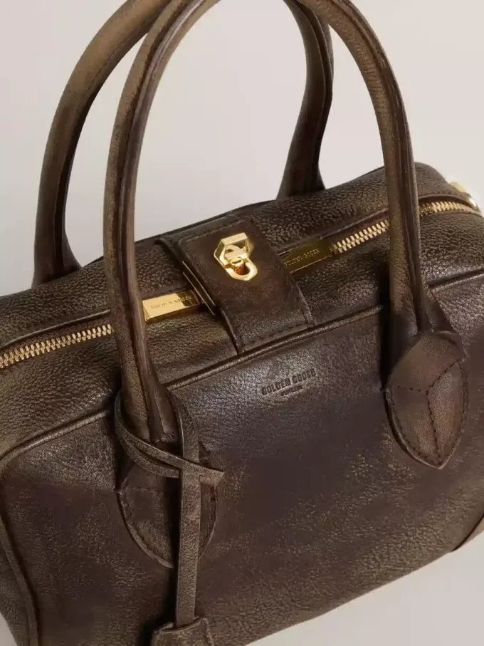 Vita-tas in bruin vintage leer met gouden details