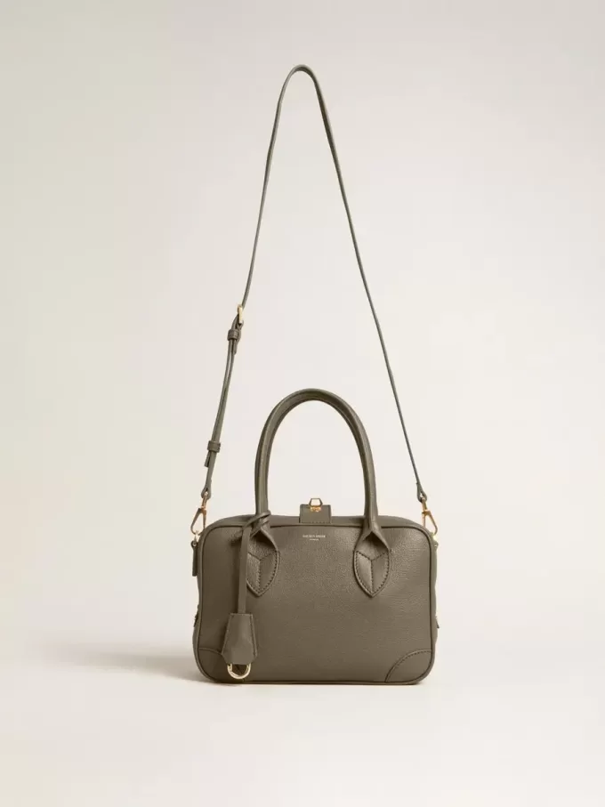 Vita-tas in saliegroen leer met gouden details