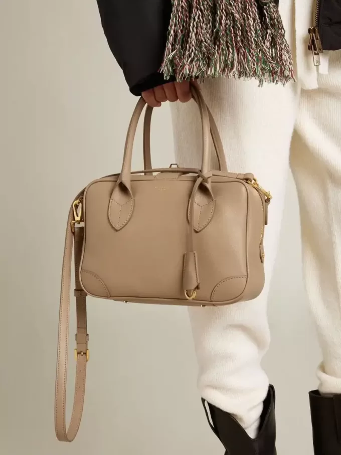 Vita-tas in taupe leer met gouden details