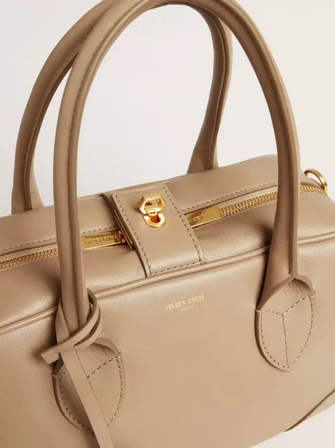 Vita-tas in taupe leer met gouden details