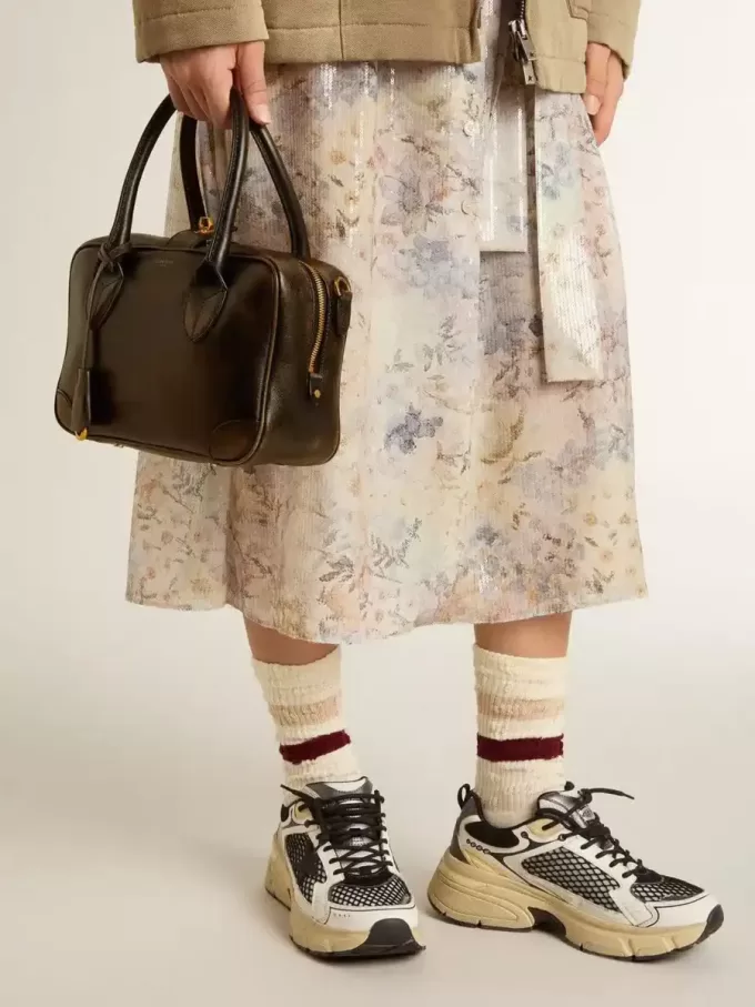 Vita-tas in zwart distressed leer met gouden details