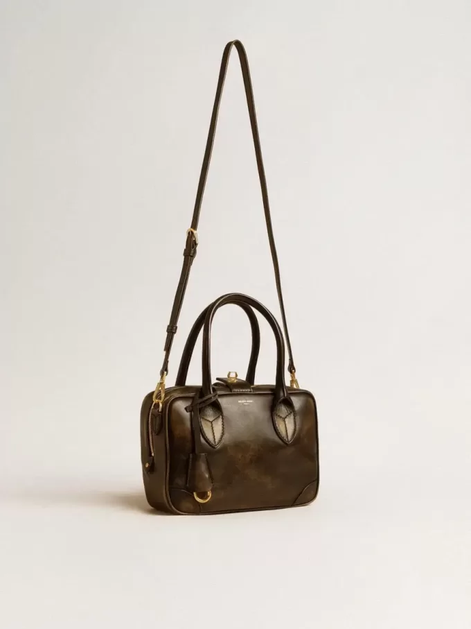 Vita-tas in zwart distressed leer met gouden details