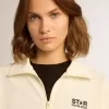 Wit damessweatshirt met ritssluiting, witte streep en zwarte sterren