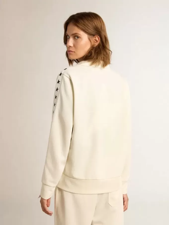 Wit damessweatshirt met ritssluiting, witte streep en zwarte sterren