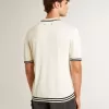 Wit gebreid poloshirt voor heren met blauwe boord