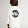 Wit katoenen poloshirt voor kinderen met borduursel op de borst en print op de rug.
