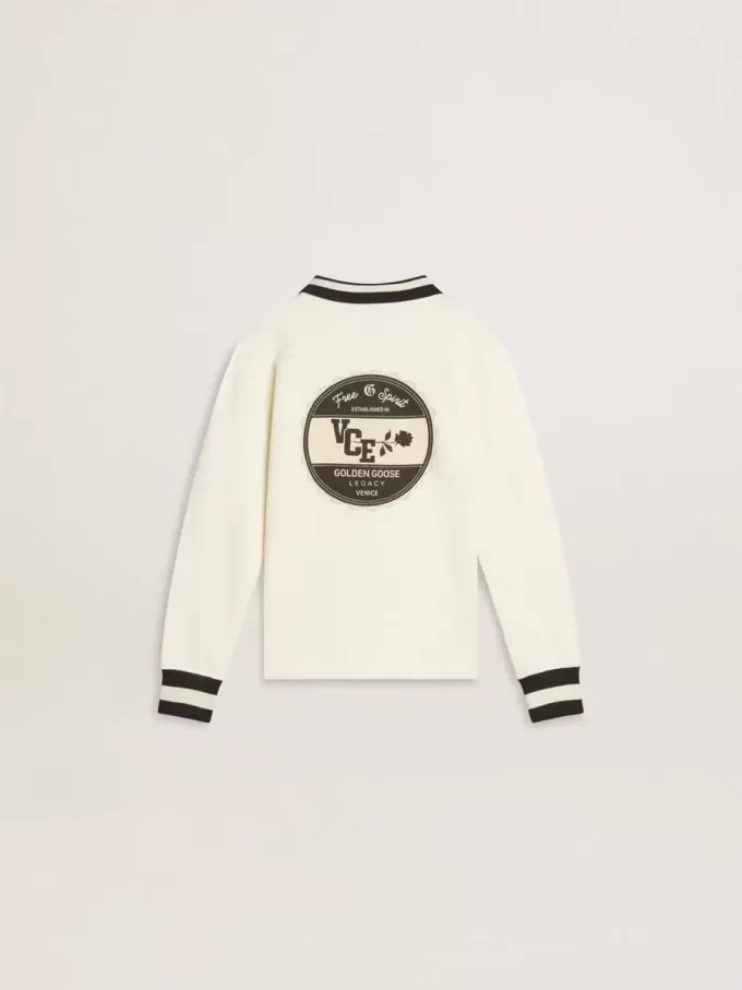 Wit katoenen poloshirt voor kinderen met borduursel op de borst en print op de rug.