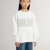 Wit sweatshirt voor meisjes met veelkleurige gouden letters op de voorkant.