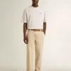 Wit unisex T-shirt met mediterrane print en Pescheria Golden-patch op de mouw