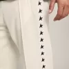 Witte joggingbroek voor heren met zwarte sterren aan de zijkanten