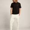 Witte joggingbroek voor heren met zwarte sterren aan de zijkanten