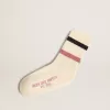Witte kindersokken met distressed details en tweekleurige lila en blauwe strepen
