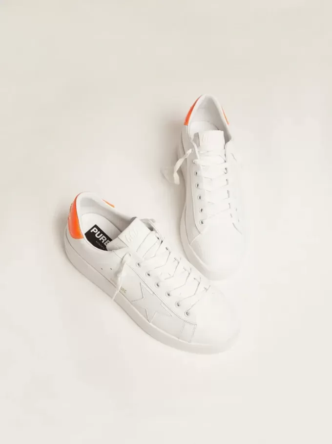 Witte Purestar sneakers met fluorescerende oranje hielband