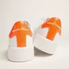 Witte Purestar sneakers met fluorescerende oranje hielband