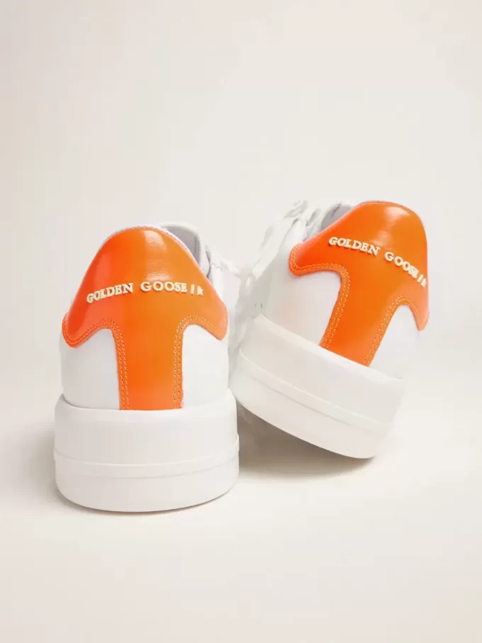 Witte Purestar sneakers met fluorescerende oranje hielband