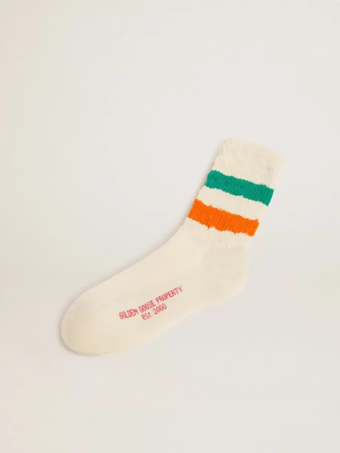 Witte sokken met distressed-afwerking en groene en oranje strepen
