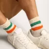 Witte sokken met distressed-afwerking en groene en oranje strepen