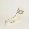 Witte sokken met distressed details en grijze strepen