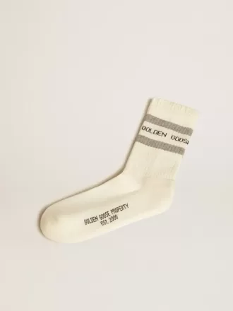 Witte sokken met distressed details en grijze strepen