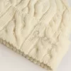 Witte wollen muts met borduursel
