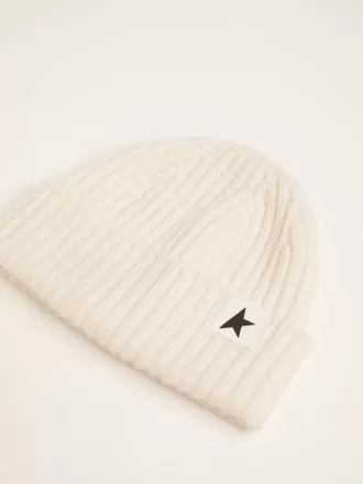 Witte wollen muts met zwarte ster