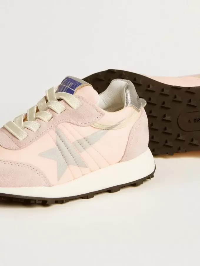 Young Marathon in roze nylon met opgedrukte ster en leren hielstuk