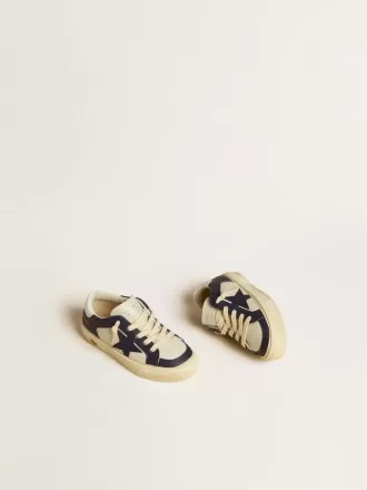 Young May in wit en blauw leer met leren ster en hielstuk