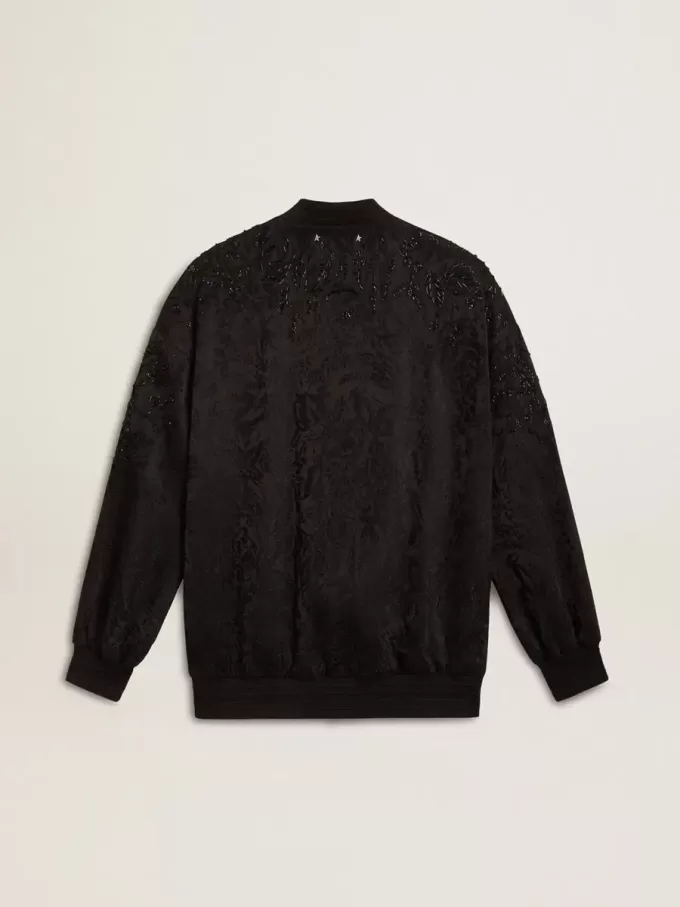 Zwart damesvest met ton-sur-ton toile de jouy-kralenborduursel