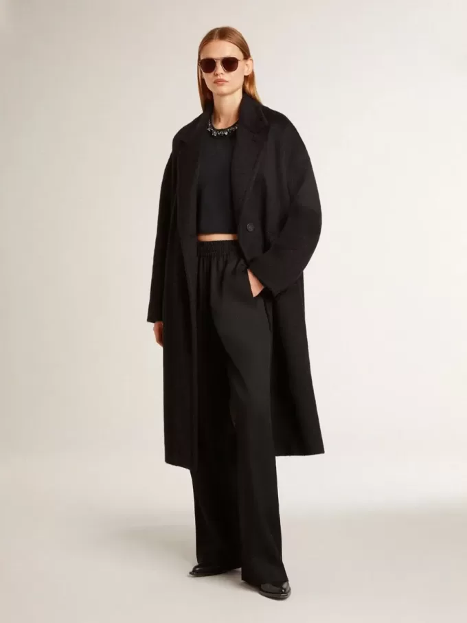Zwarte cocoonjas voor dames met enkele knoopsluiting