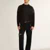 Zwarte herenjeans met een losse pasvorm en een all-over kristallen met kleurverloop.