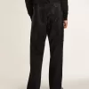Zwarte herenjeans met een losse pasvorm en een all-over kristallen met kleurverloop.