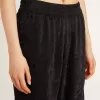 Zwarte joggingbroek voor dames met een ton sur ton toile de jouy-print