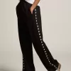 Zwarte joggingbroek voor dames met witte sterren aan de zijkanten