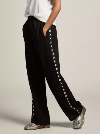 Zwarte joggingbroek voor dames met witte sterren aan de zijkanten