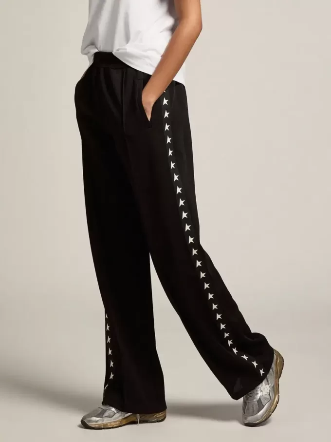 Zwarte joggingbroek voor dames met witte sterren aan de zijkanten