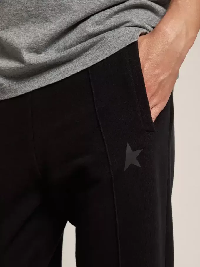 Zwarte joggingbroek voor heren met ster op de voorkant