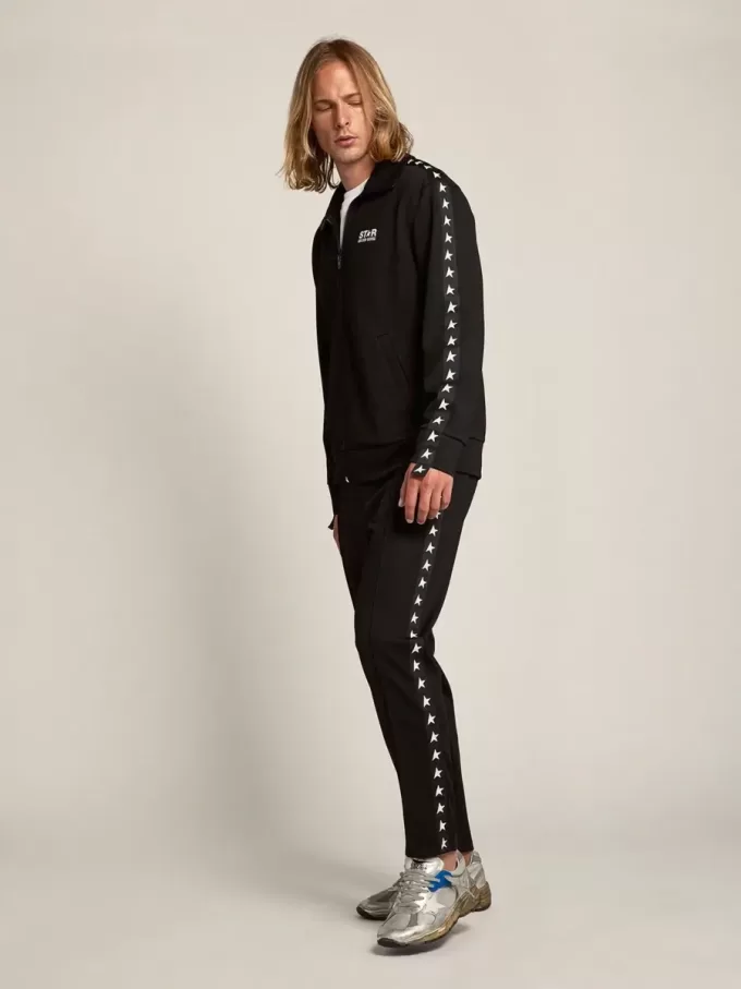 Zwarte joggingbroek voor heren met witte sterren aan de zijkanten