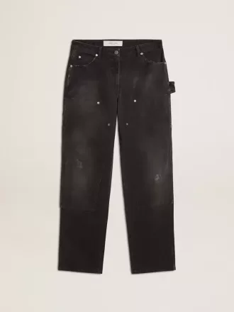 Zwarte katoenen damesjeans met slijtage-effect en patches aan de voorkant